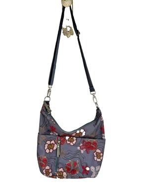 Haiku Ascend floral print crossbody bag in a grey color